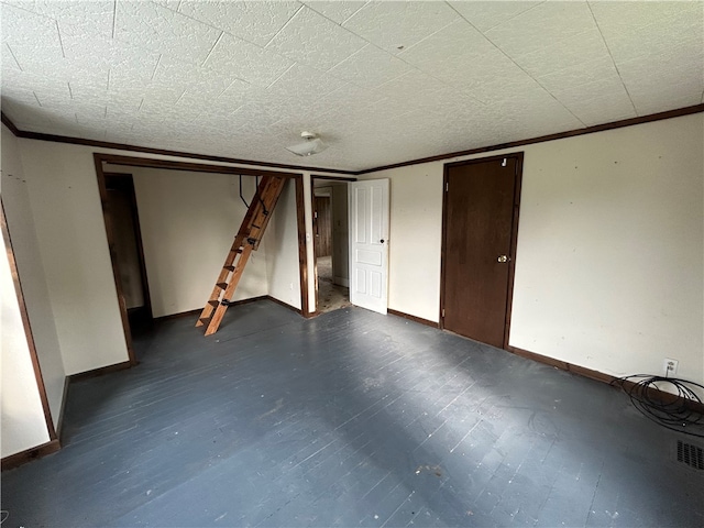 basement featuring a textured ceiling