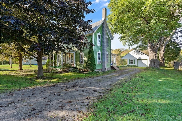 view of side of home featuring a yard