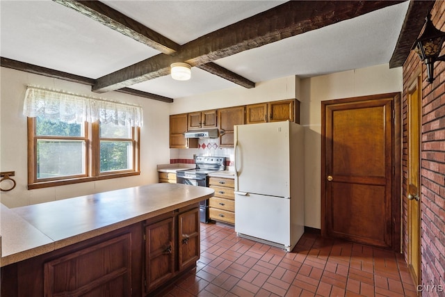 kitchen featuring white refrigerator, beamed ceiling, stainless steel range with electric cooktop, decorative backsplash, and brick wall