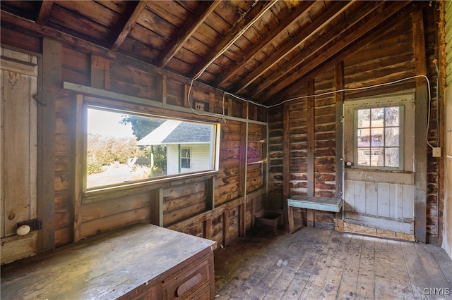 misc room with wood ceiling, lofted ceiling, wood walls, and dark hardwood / wood-style flooring