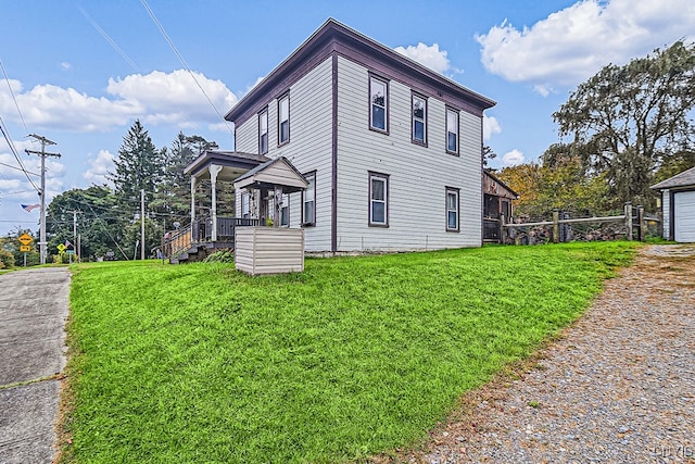 view of home's exterior with a yard