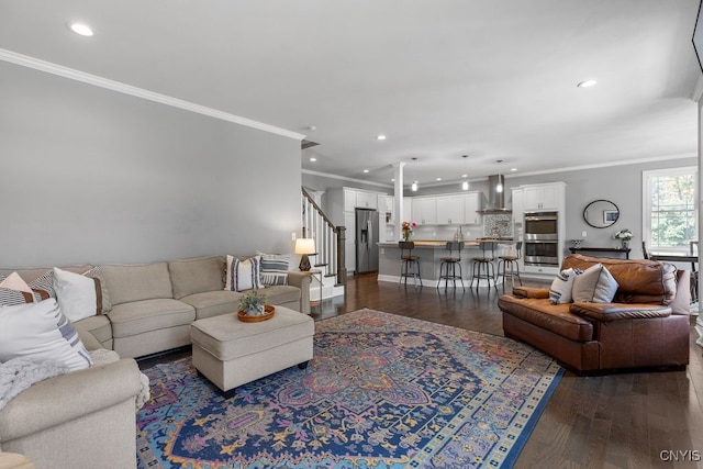 living room featuring crown molding and dark hardwood / wood-style flooring