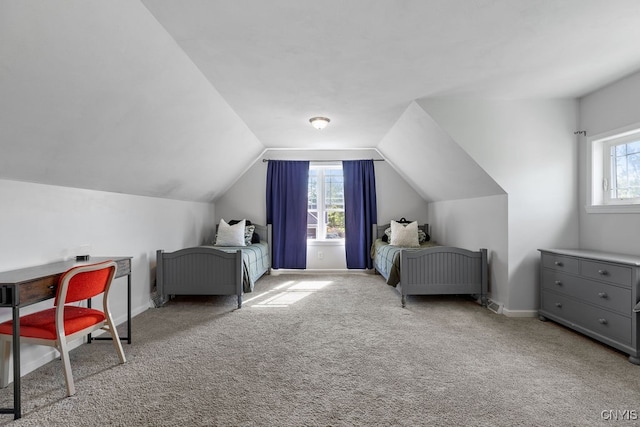 bedroom with light carpet, lofted ceiling, and multiple windows