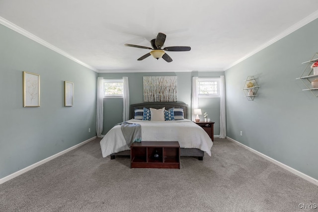 carpeted bedroom featuring ceiling fan, crown molding, and multiple windows