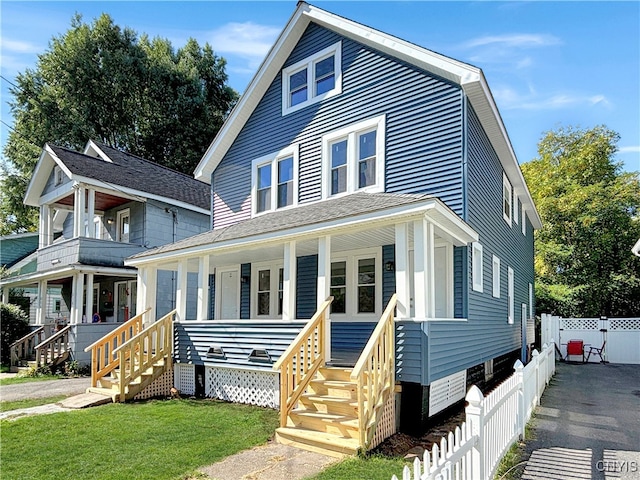 view of front of home featuring a porch and a front lawn