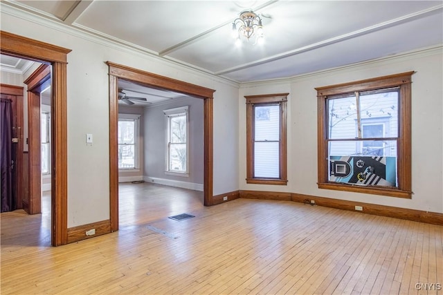 empty room with crown molding, light hardwood / wood-style floors, and ceiling fan with notable chandelier