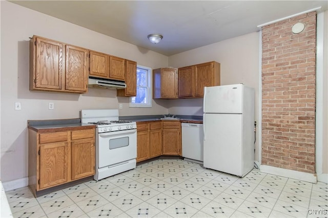 kitchen with white appliances and sink