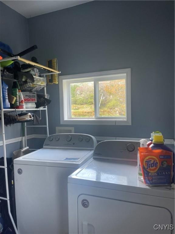 laundry room with washer and dryer