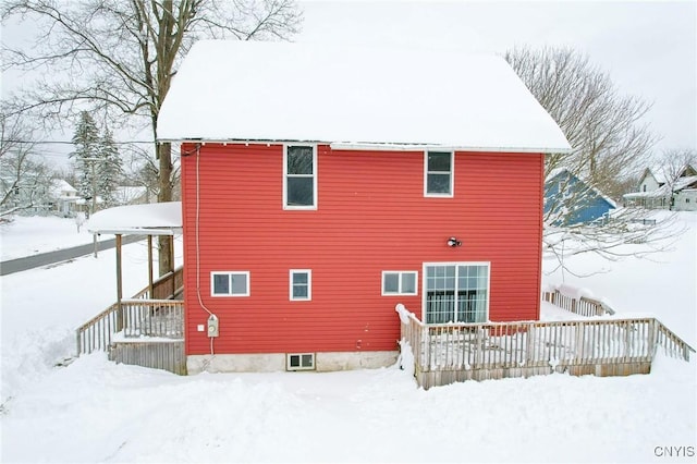 view of snow covered house