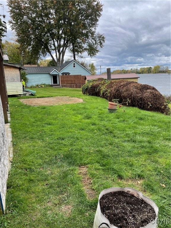 view of yard with a water view