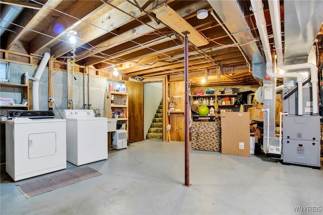 basement featuring separate washer and dryer