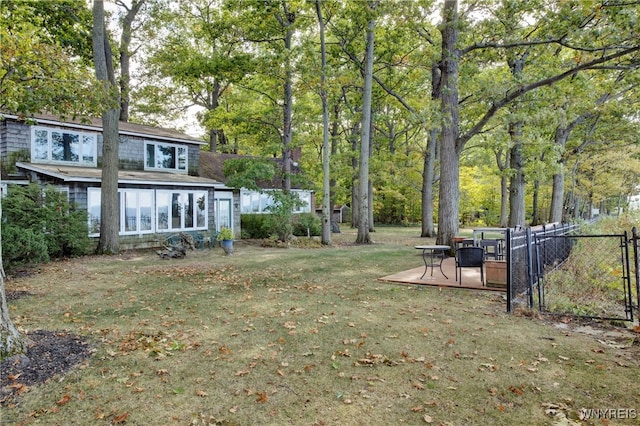 view of yard with a deck