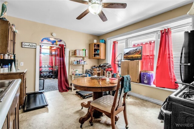 dining room featuring ceiling fan