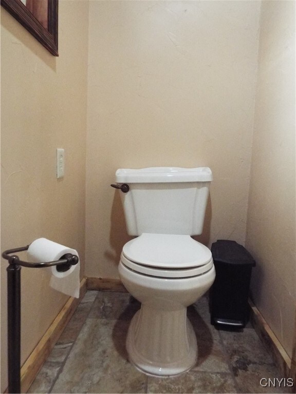 bathroom featuring toilet