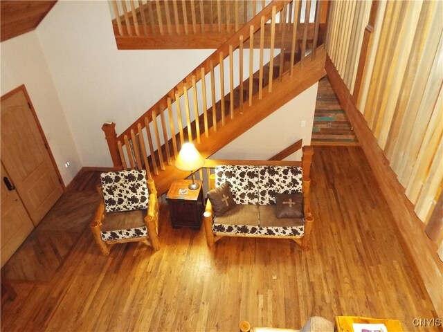 stairway featuring hardwood / wood-style floors