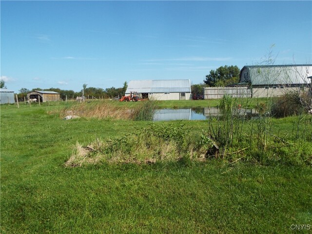 view of yard with a water view