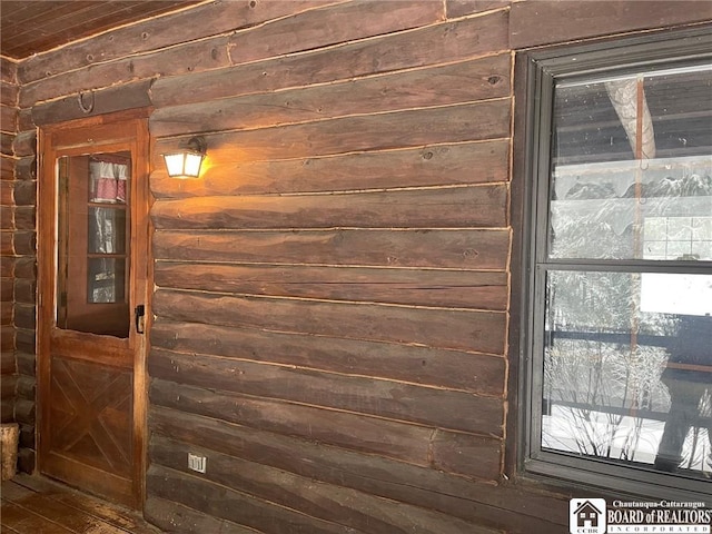 room details featuring wooden walls