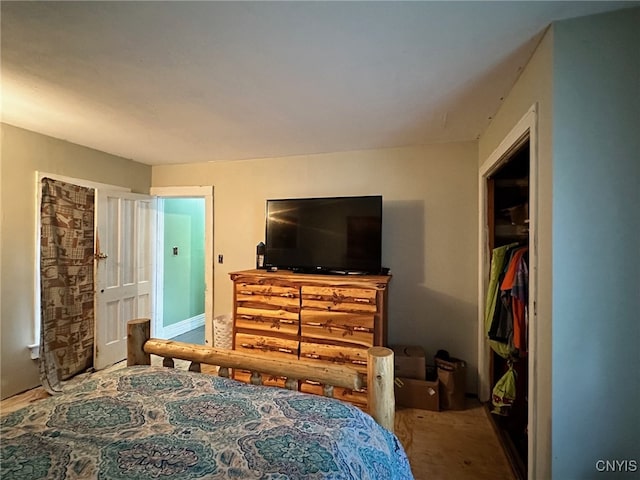 carpeted bedroom with a closet