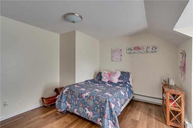 bedroom featuring a baseboard radiator, wood-type flooring, and lofted ceiling