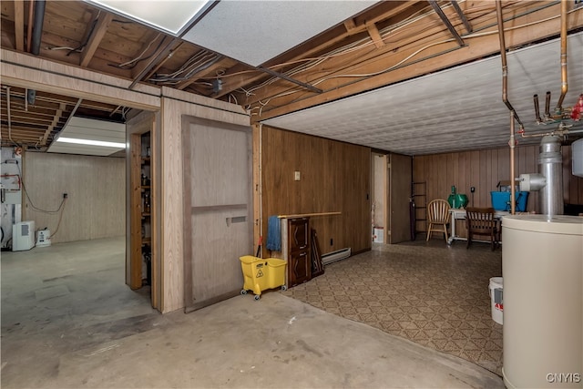 basement with wooden walls and baseboard heating