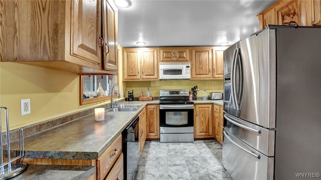 kitchen featuring stainless steel appliances and sink