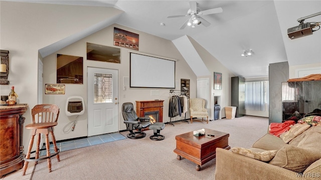 living room featuring light colored carpet, vaulted ceiling, and a wealth of natural light