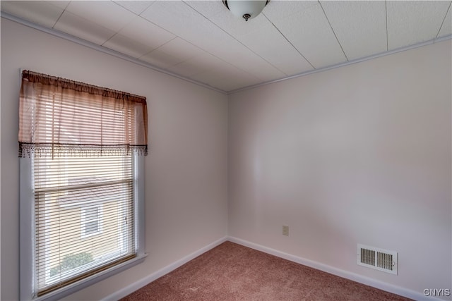 empty room featuring carpet flooring