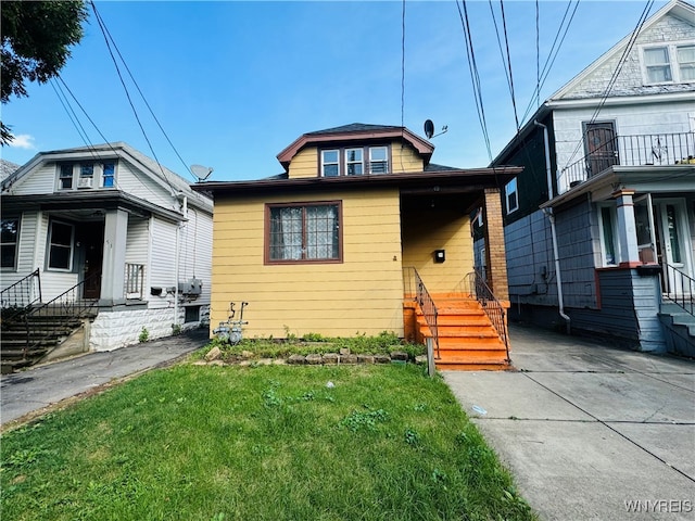 bungalow with a front lawn