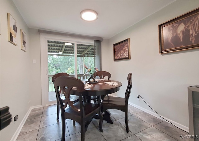 dining room featuring tile patterned flooring