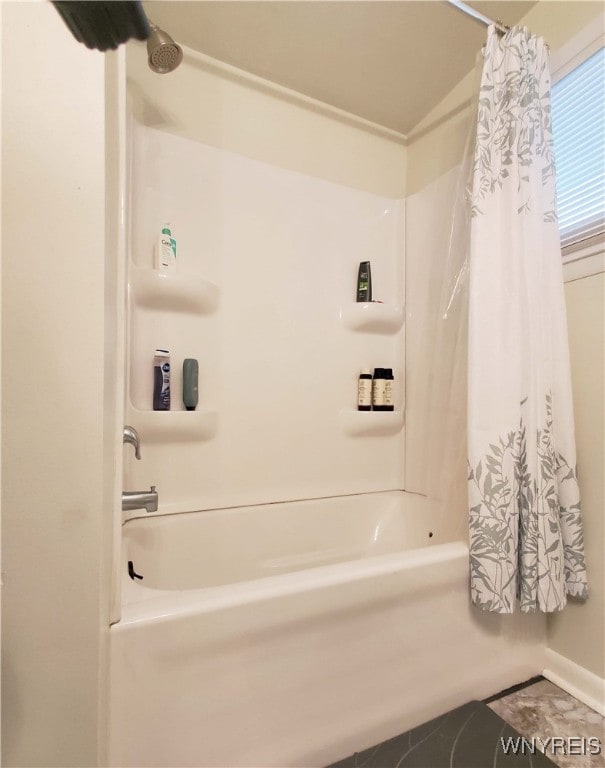 bathroom featuring shower / bath combo