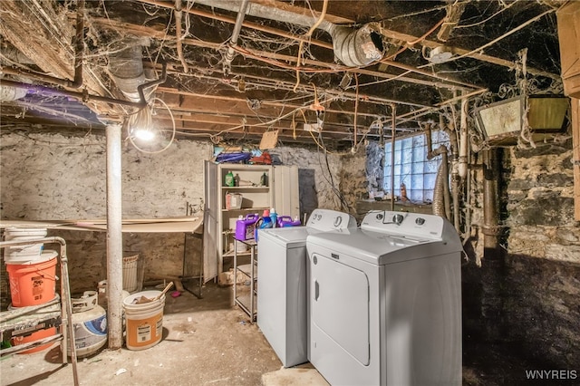 laundry room with separate washer and dryer