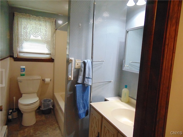 full bathroom featuring vanity, toilet,  shower combination, and a baseboard heating unit