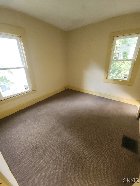 view of carpeted spare room