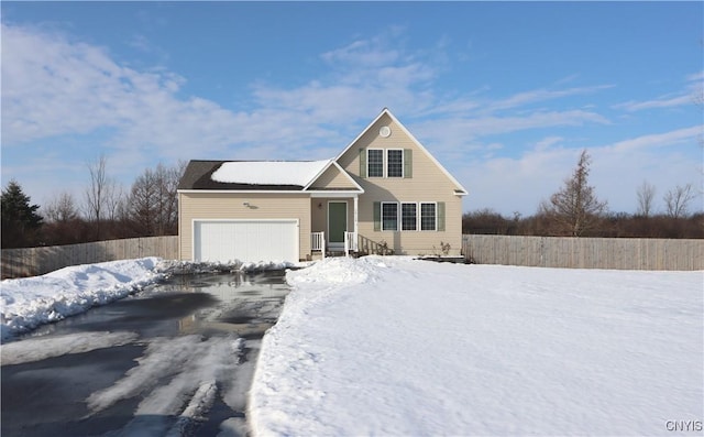 view of front of property with a garage