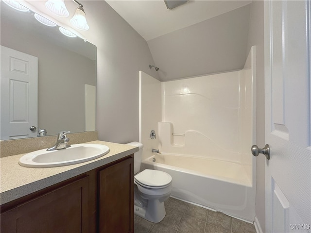 full bathroom featuring tile patterned flooring,  shower combination, vaulted ceiling, toilet, and vanity