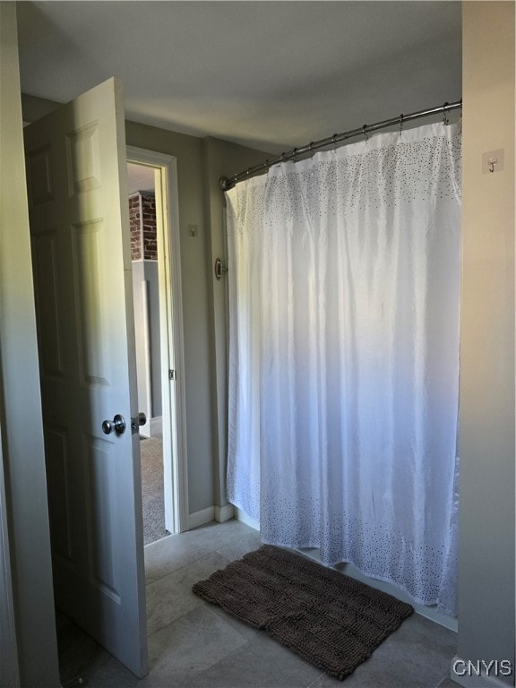 bathroom featuring walk in shower