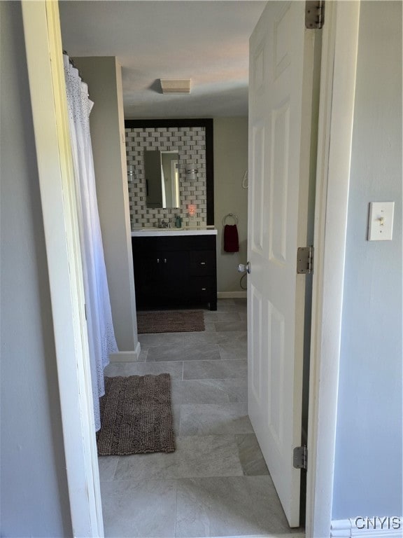 bathroom with vanity and a shower with curtain