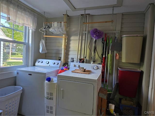 laundry area with washing machine and dryer