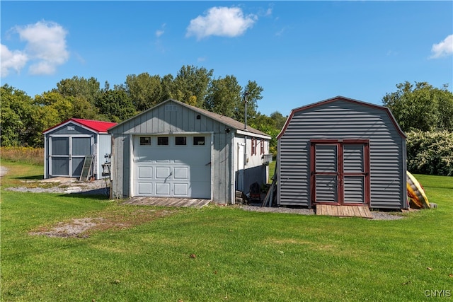 garage with a lawn