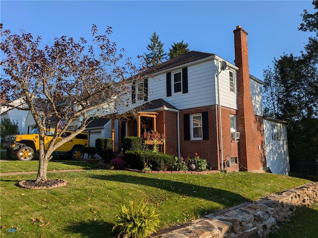 view of front property featuring a front lawn