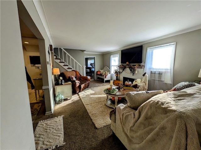 carpeted living room featuring cooling unit and ornamental molding