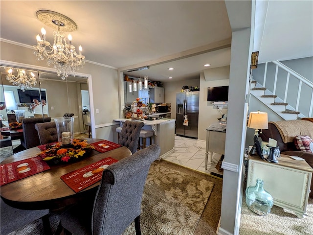 dining room featuring a notable chandelier and crown molding