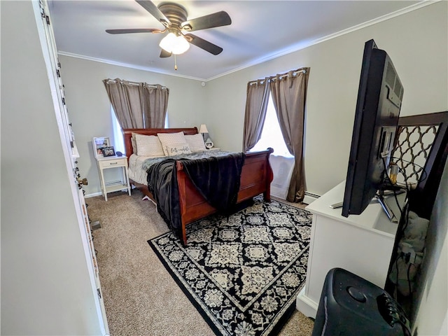 carpeted bedroom with a baseboard heating unit, ceiling fan, and crown molding