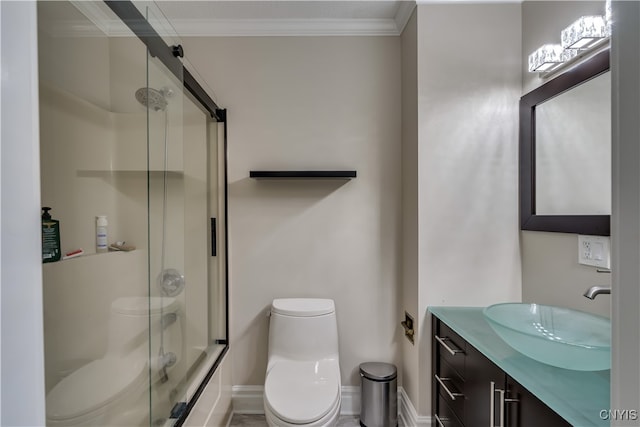 full bathroom with ornamental molding, vanity, toilet, and shower / bath combination with glass door