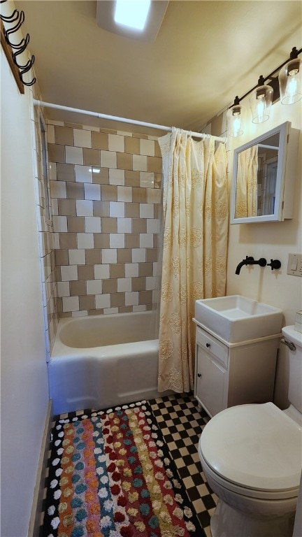 full bathroom with vanity, shower / tub combo with curtain, and toilet