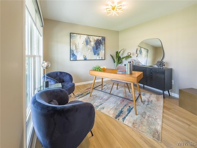 299 Cardinal Way N, Tonawanda, NY 14120 - office area featuring baseboards and wood finished floors