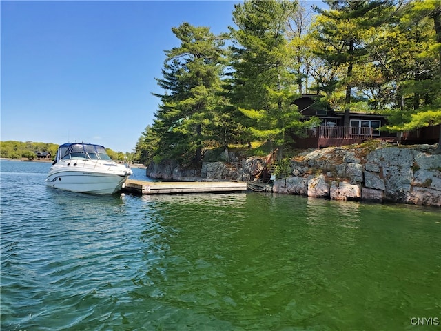 view of dock with a water view