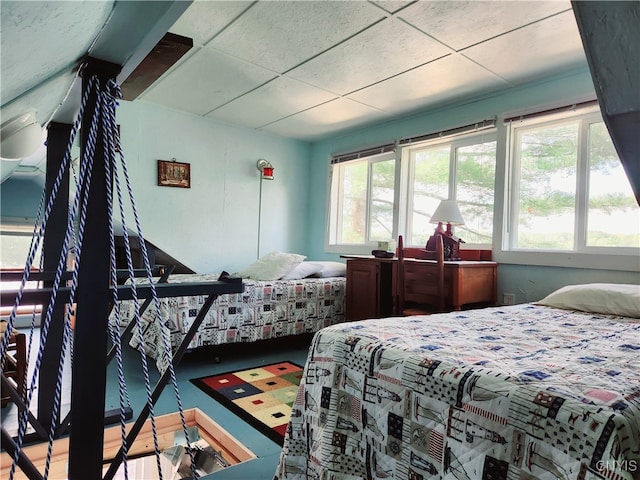 bedroom featuring multiple windows