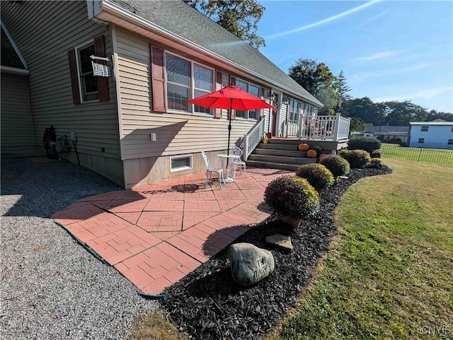 644 Main St, Independence, NY 14897 - view of home's exterior with a patio area, a shingled roof, and a deck