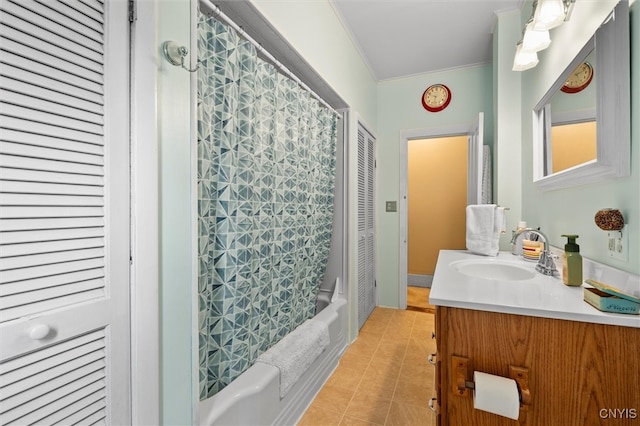 bathroom with shower / bath combination with curtain, vanity, crown molding, and tile patterned floors